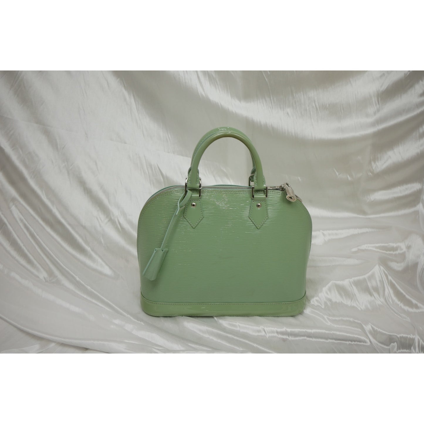 Louis Vuitton Alma Watercoat PM