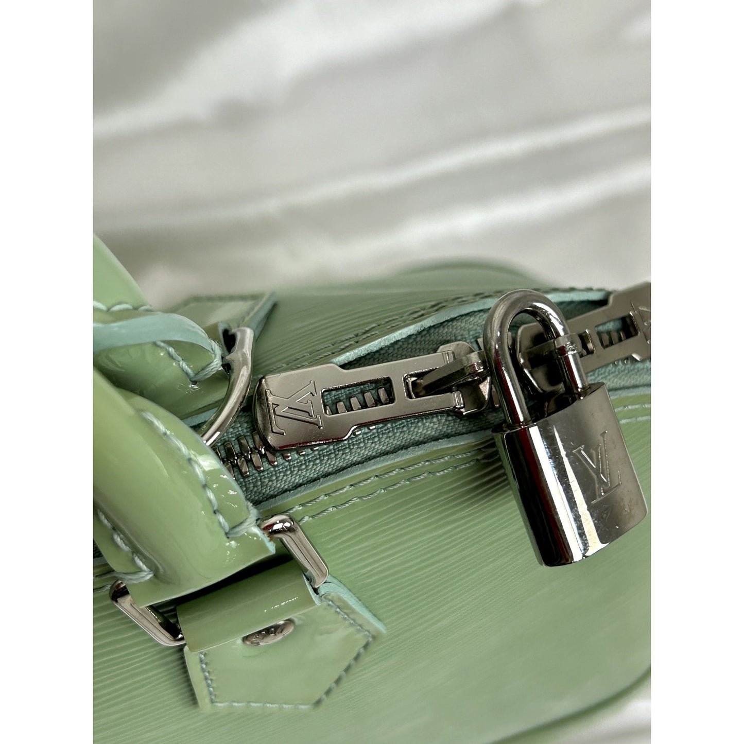 Louis Vuitton Alma Watercoat PM
